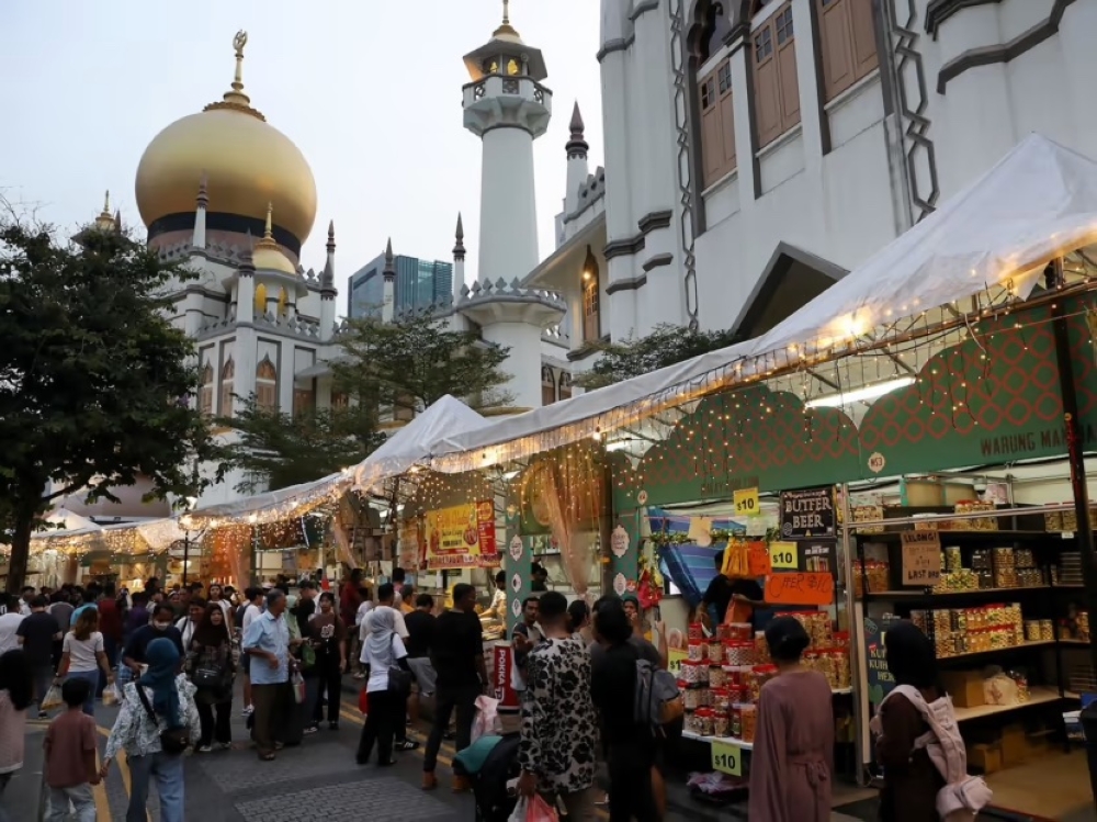 A pasar malam — Malay for night market — in Kampong Glam on April 16, 2023. For decades, trade fairs such as festive bazaars and neighbourhood pasar malam have been a common sight in Singapore. — TODAY pic