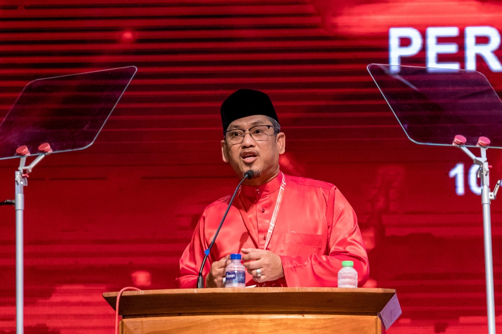 Bersatu deputy president Datuk Seri Ahmad Faizal Azumu speaks at the Bersatu annual grand meeting (AGM) at Menara PGRM in Kuala Lumpur March 12, 2023. — Picture by Firdaus Latif
