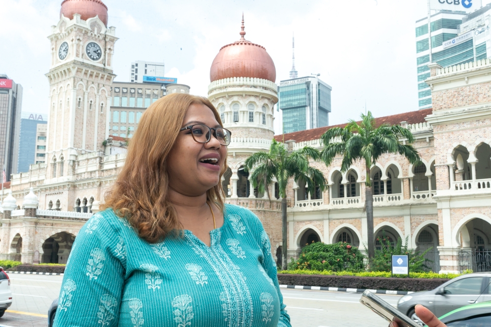 Anusiah Naidu Mohnaraju speaks to a Malay Mail reporter at Dataran Merdeka during the extended holiday for Hari Raya Aidilfitri April 24, 2023. — Picture by Raymond Manuel