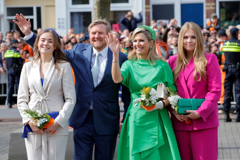 King Willem-Alexander and Queen Maxima of the Netherlands pose with their daughters, Princess Ariane and Princess Catharina-Amalia, during King's Day (Koningsdag) in Rotterdam. —  Reuters pic