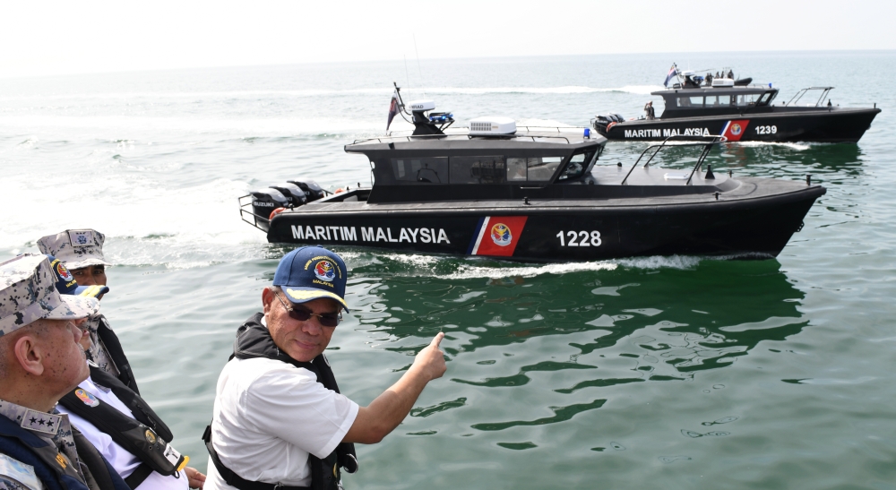Home Minister Datuk Seri Saifuddin Nasution Ismail says overall he is very satisfied with Op Khas Pagar Laut and hopes that the MMEA will continue to carry out efforts to safeguard the country's waters. ― Bernama pic