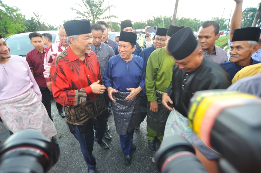 Barisan Nasional chairman and Umno president Datuk Seri Ahmad Zahid Hamidi and Umno secretary-general Datuk Seri Ahmad Maslan at the Pontian Umno division Hari Raya Aidilfitri Open House at the Kompleks Muafakat Benut in Pontian April 28, 2023. — Picture by Ben Tan