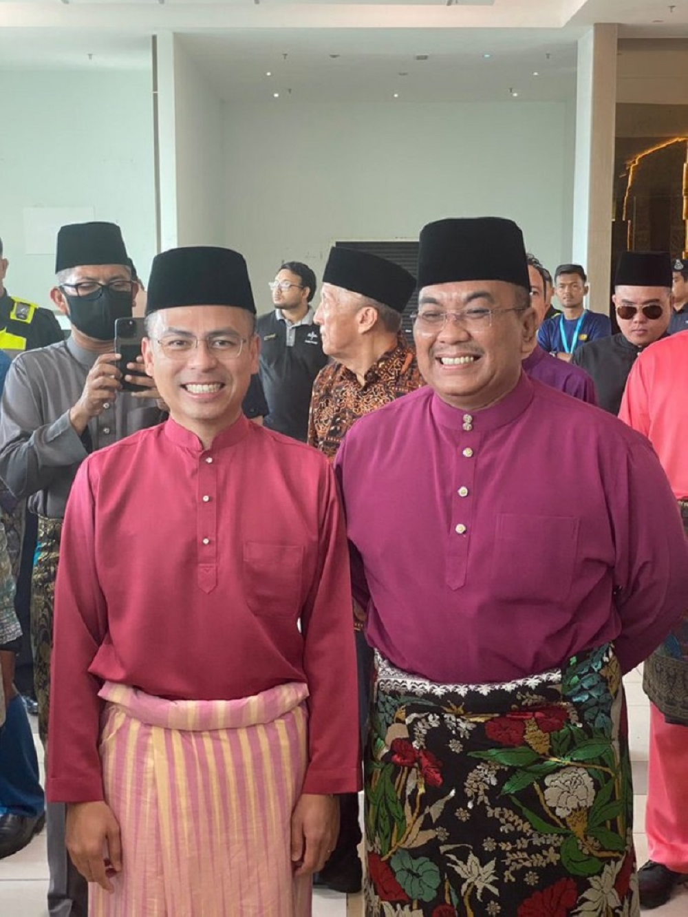 Communications and Digital Minister Fahmi Fadzil (left) and Kedah Menteri Besar Datuk Seri Muhammad Sanusi Md Nor at the Malaysia Madani Aidilfitri open house in Alor Setar April 29, 2023. ― Picture via Twitter/bernamadotcom