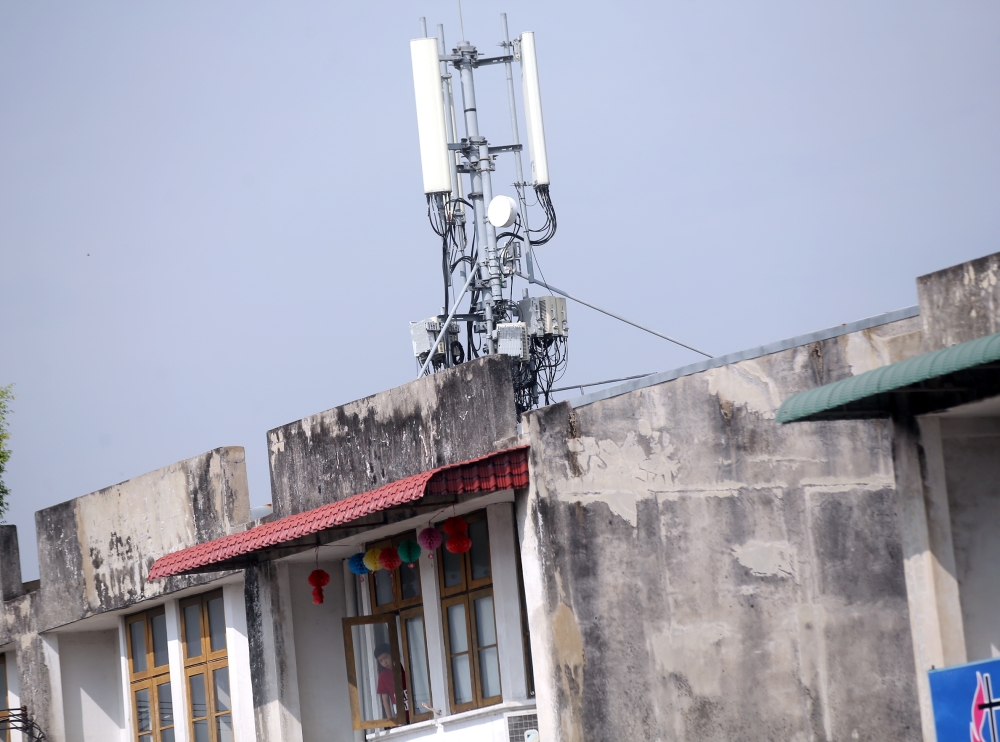 File picture of a telecommunication tower on the roof of a shoplot in Taman Pusat Bercham, Perak May 15, 2019. — Picture by Farhan Najib