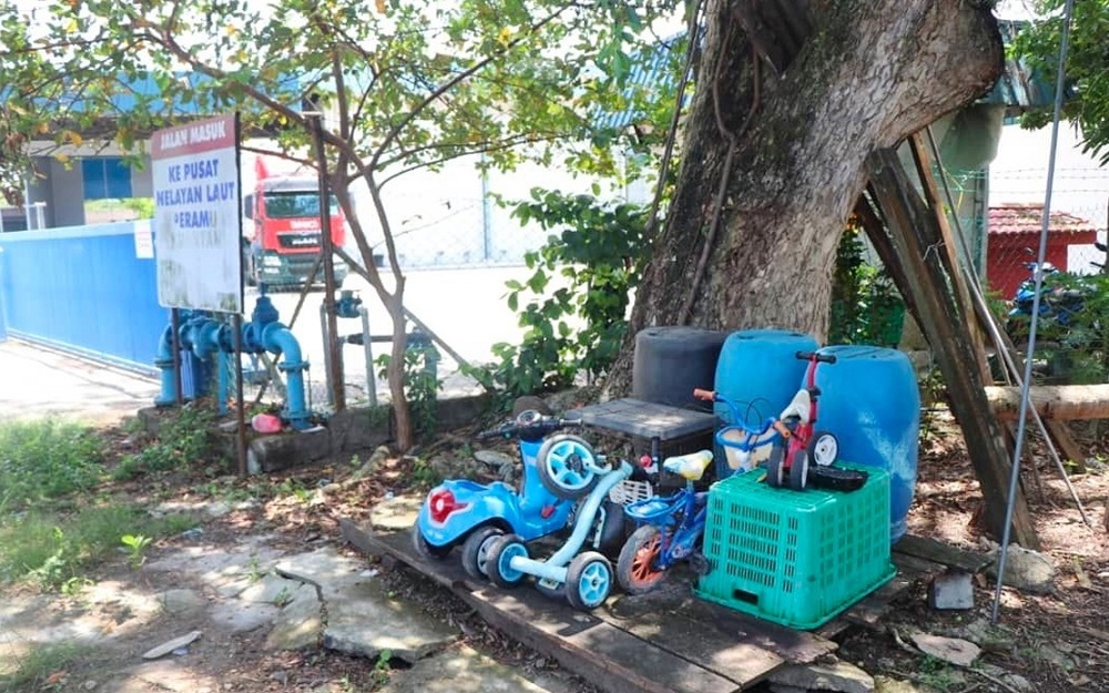 A newborn baby boy with insect bites and his umbilical cord still attached was found on wooden planks near a factory fence in Kampung Peramu, Pahang April 29, 2023. — Picture courtesy of PDRM