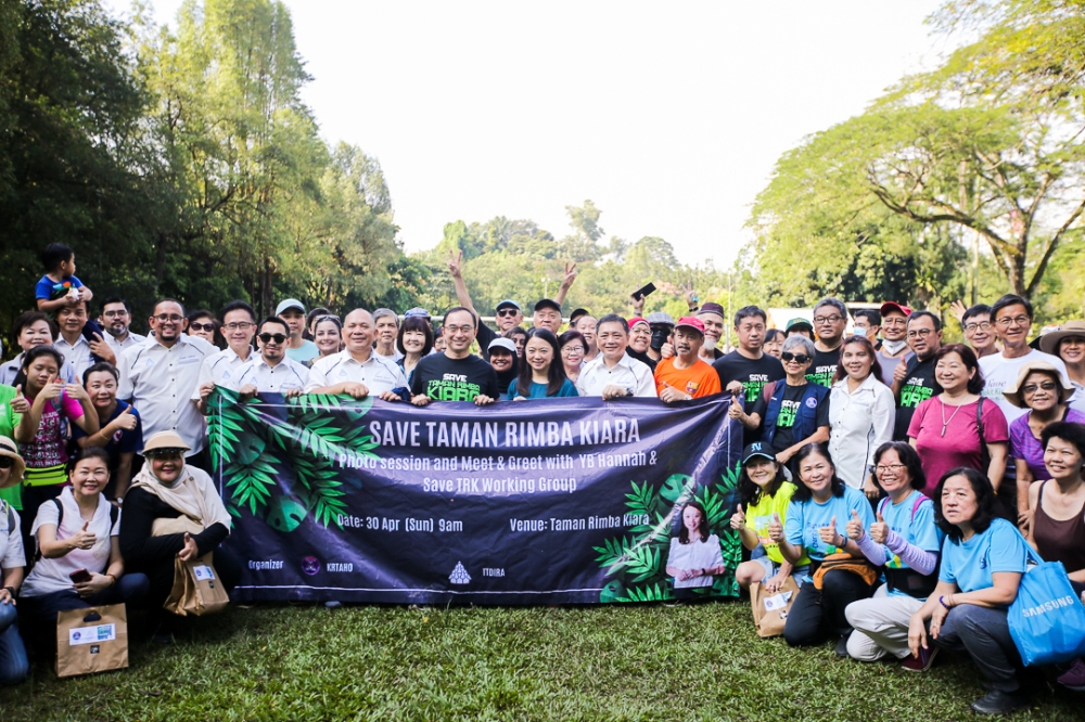Segambut MP Hannah Yeoh with the residents and organisers of the Save Taman Rimba Kiara movement  — Picture by Ahmad Zamzahuri