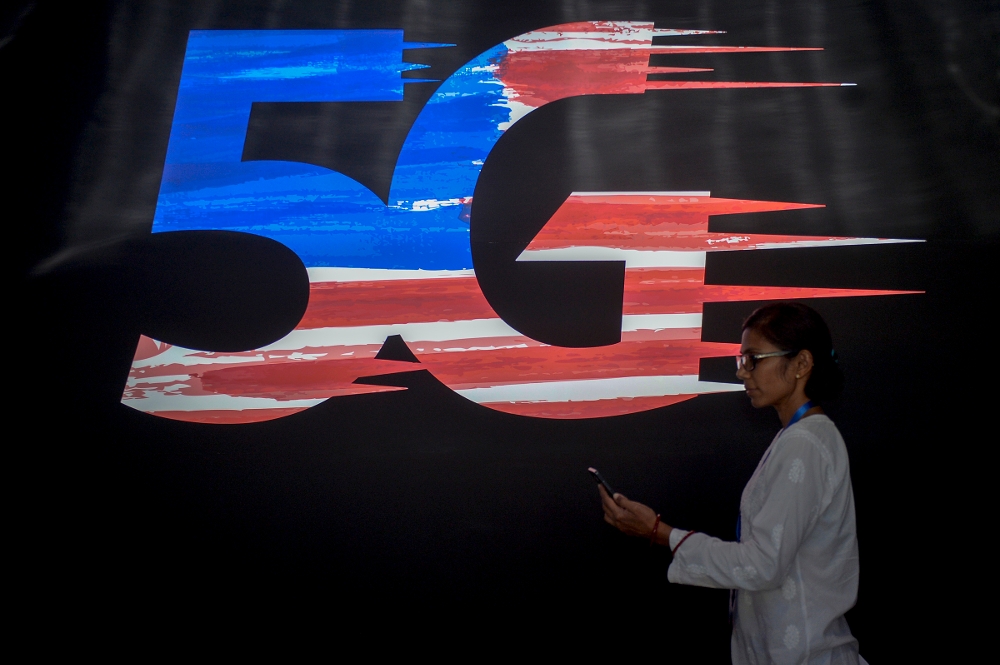 CelcomDigi Berhad today announced it will participate in any new processes after the government rolled out a dual wholesale 5G network. — Picture by Mukhriz Hazim