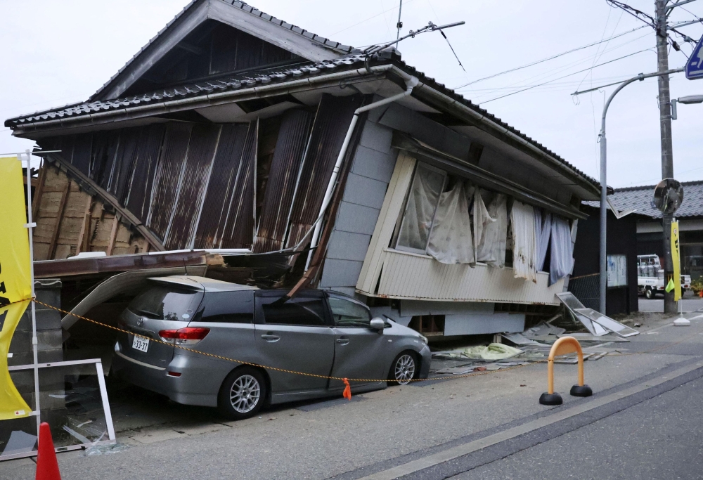Strong Earthquake Kills One Destroys Houses In Japan Malay Mail