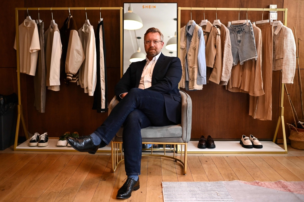 Global Head of Strategy and Corporate Affairs at Chinese fashion brand Shein, Peter Pernot-Day, poses during a photo session at the Shein offices in Paris May 4, 2023. — AFP pic