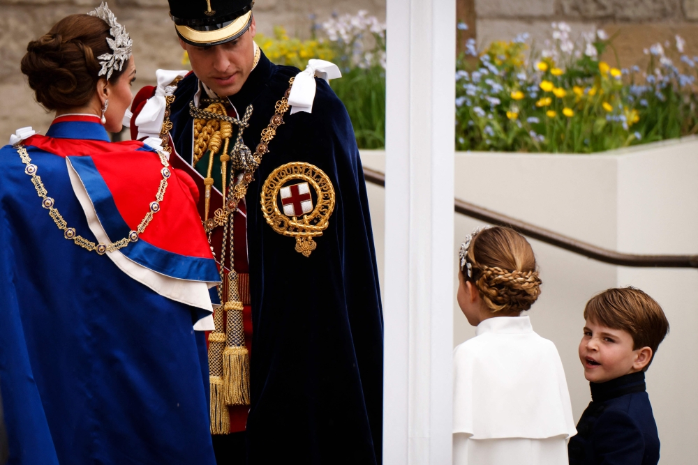 Britain's Prince William, Prince of Wales, Britain's Catherine, Princess of Wales, Britain's Princess Charlotte of Wales and Britain's Prince Louis of Wales arrive at Westminster Abbey in central London on May 6, 2023. — AFP pic