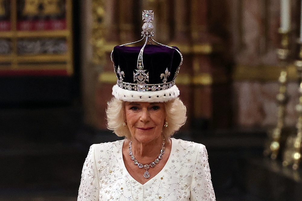 Britain's Camilla walks wearing a modified version of Queen Mary's Crown during the Coronation Ceremony inside Westminster Abbey in central London, on May 6, 2023. — AFP pic