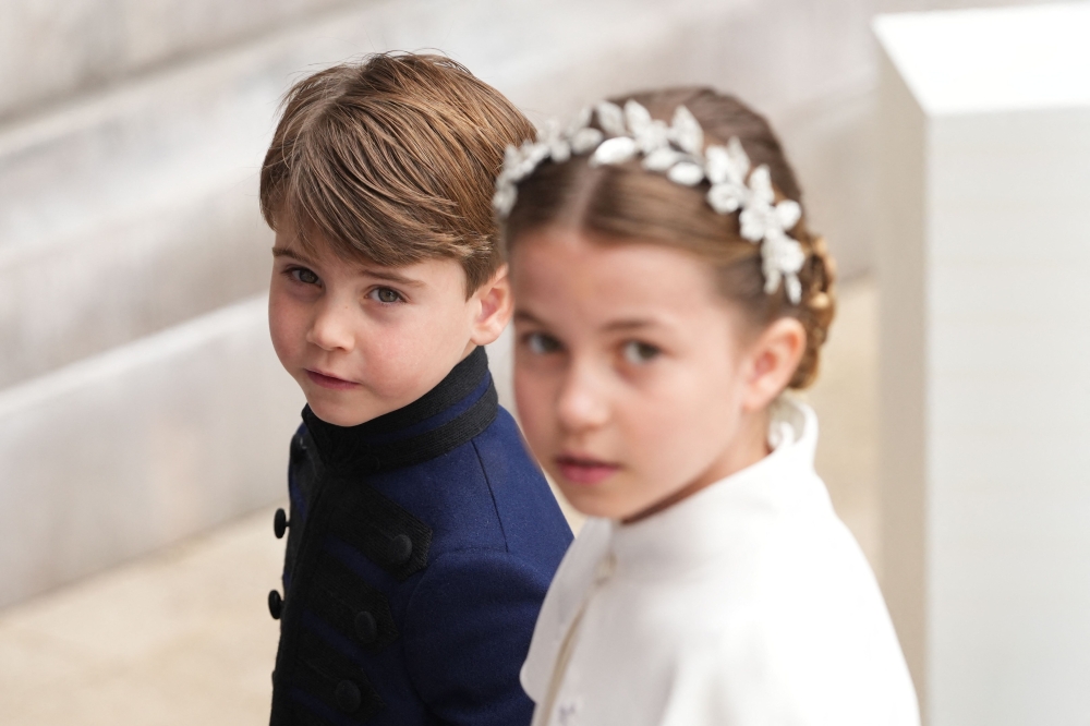 Britain's Princess Charlotte of Wales and Britain's Prince Louis of Wales arrive at Westminster Abbey in central London on May 6, 2023, ahead of the coronations of Britain's King Charles III and Britain's Camilla, Queen Consort. — AFP pic