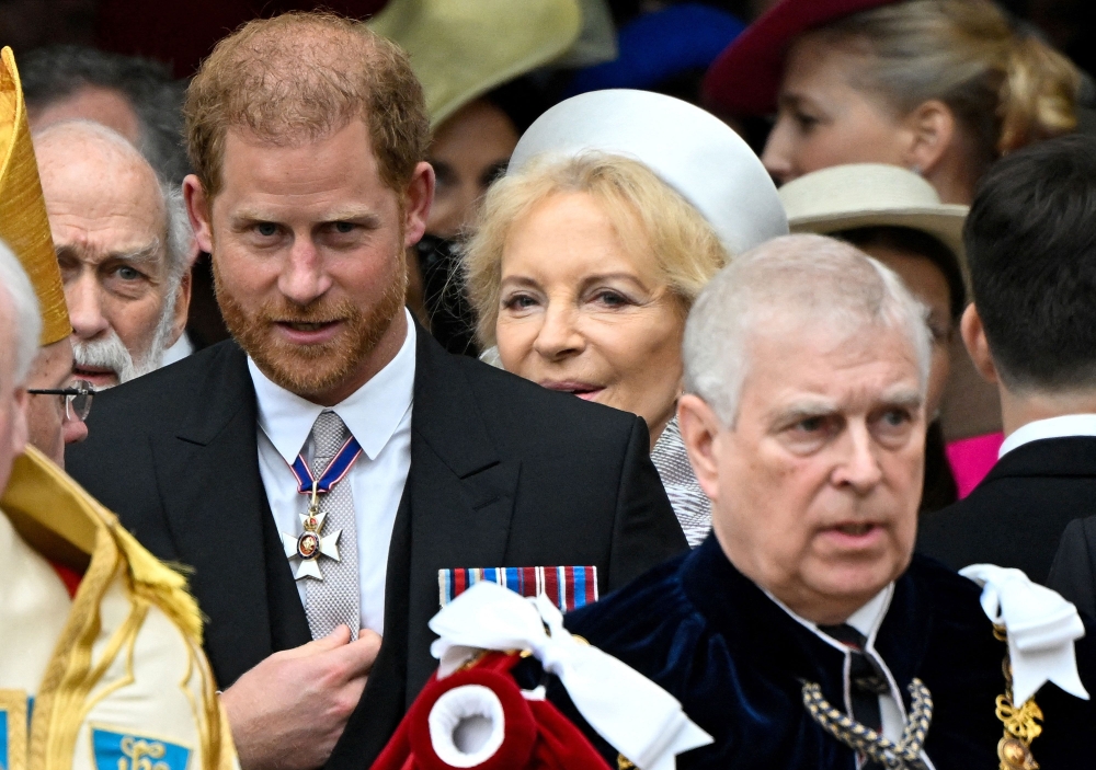 Britain’s Prince Harry, Duke of Sussex (left) and Britain’s Prince Andrew, Duke of York (right) leave after attending the coronations of Britain’s King Charles III and Britain’s Camilla, Queen Consort, at Westminster Abbey in central London on May 6, 2023. — AFP pic
