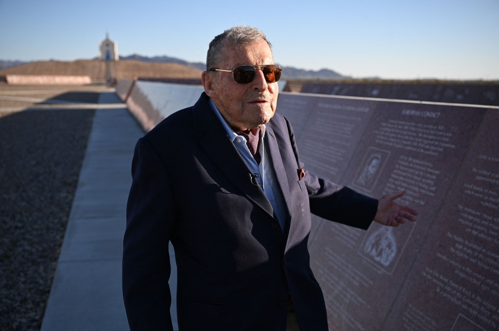French-American Jacques-Andre Istel, 94, is photographed beside a panel of the Museum of History in Granite n Felicity, California on April 11, 2023. — AFP pic