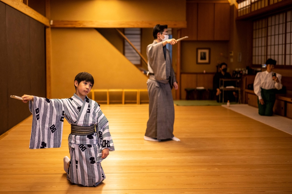 Like most 10-year-olds in Japan, Maholo Terajima enjoys baseball and video games, but his schedule also includes swordfights, choreography and fan dancing to prepare for his kabuki debut. — AFP pic