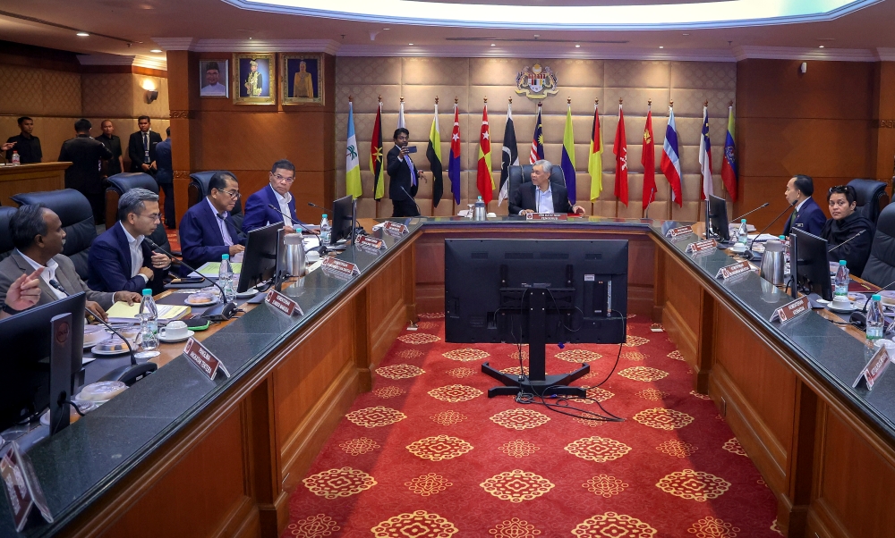 Deputy Prime Minister Datuk Seri Ahmad Zahid Hamidi is seen chairing the meeting of the high-level committee on the management of refugees and asylum seekers. — Bernama pic
