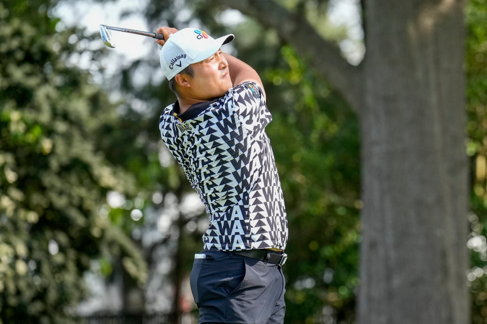 KH Lee hits his tee shot on six during the second round of the Wells Fargo Championship golf tournament. ― Jim Dedmon-USA TODAY Sports via Reuters