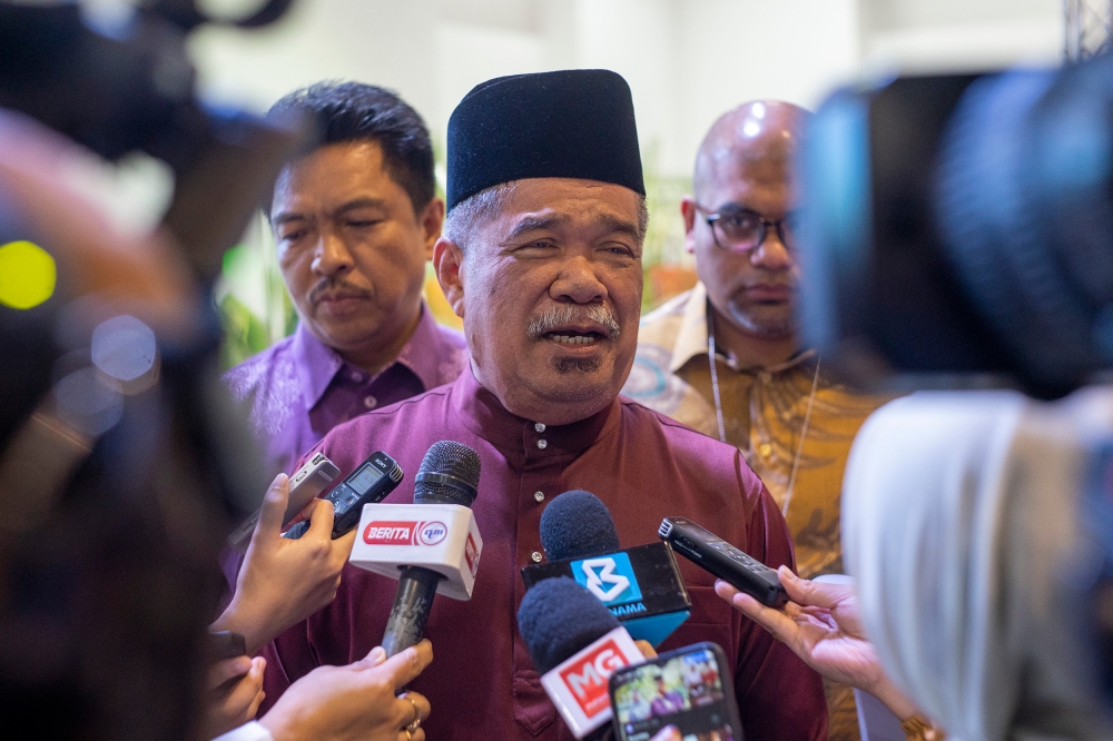 Minister of Agriculture and Food Security, Datuk Seri Mohamad Sabu speaks to the media at his ministry’s open house event for Hari Raya Aidilfitri in Serdang May 11, 2023. — Picture by Shafwan Zaidon