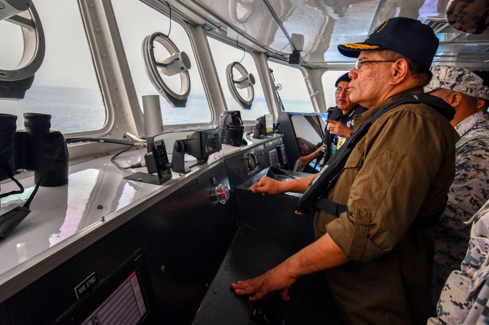 Home Minister Datuk Seri Saifuddin Nasution Ismail is seen on board KM Jujur during a visit to the Pengkalan Kubor Malaysian Maritime Enforcement Agency (MMEA) base in Tumpat May 11, 2023. — Bernama pic