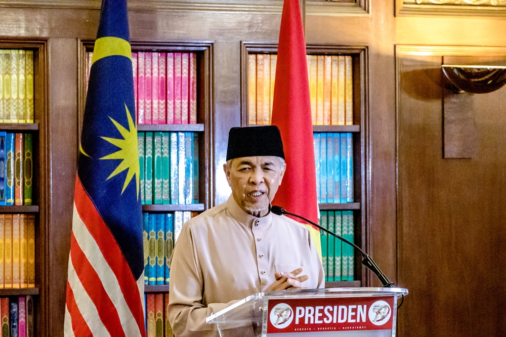 Umno president Datuk Seri Ahmad Zahid Hamidi speaks during the Umno 77th anniversary at World Trade Centre Kuala Lumpur May 11, 2023. — Picture by Firdaus Latif