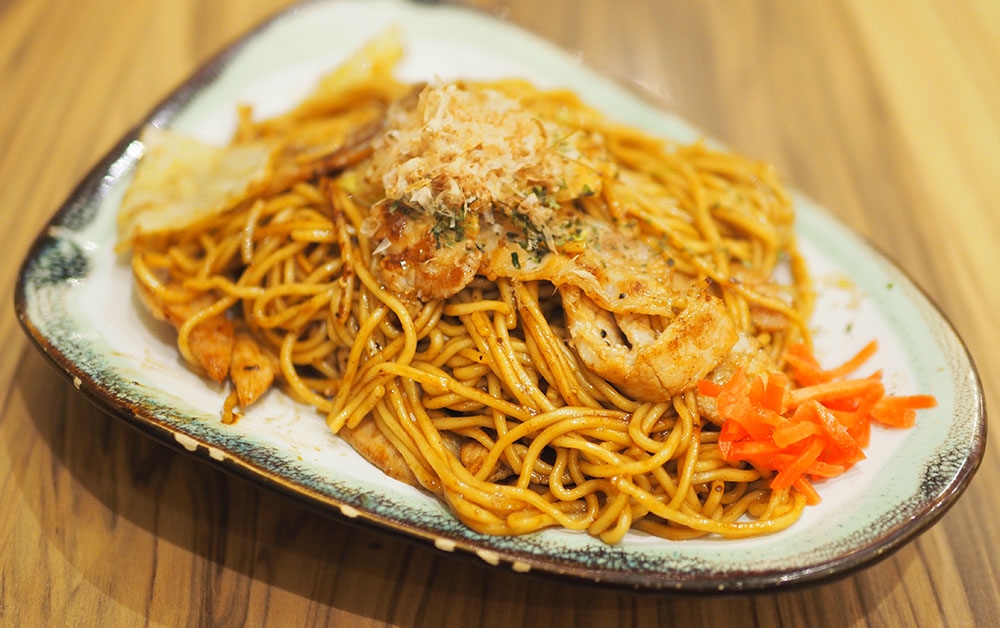 Try the yaki soba which is not too sweet and tasty.