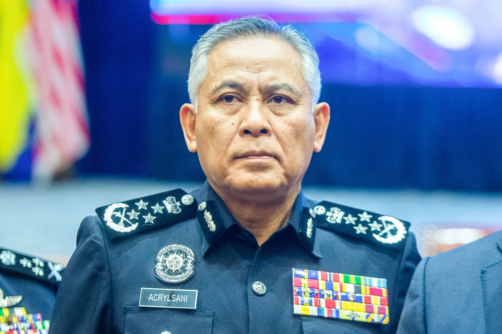 IGP Tan Sri Acryl Sani Abdullah Sani says the Royal Malaysia Police (PDRM) and the Malaysian Anti-Corruption Commission (MACC) will work together and discuss further on efforts to bring Jho Low back to the country. ― Picture by Shafwan Zaidon
