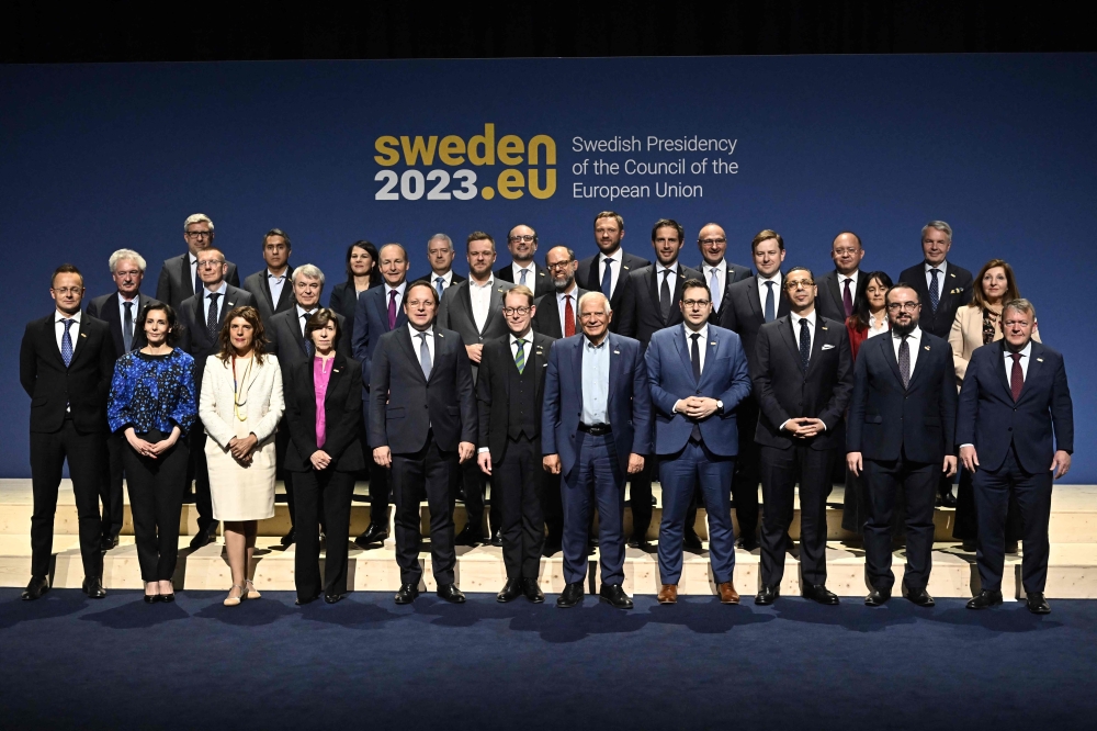 Sweden's Foreign Minister Tobias Billstrom (centre left) and the High Representative of the European Union for Foreign Affairs and Security Policy Josep Borrell Fontelles (centre right) pose for a family photo with EU's foreign ministers and relevant EU commissioners during an informal meeting of EU foreign ministers in Stockholm May 12, 2023. — AFP pic