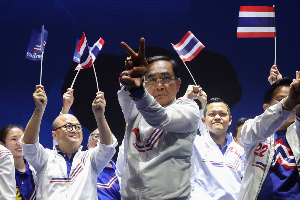 Incumbent Thailand's Prime Minister Prayuth Chan-ocha gestures at United Thai Nation Party's rally event ahead of the upcoming general election, in Bangkok May 12, 2023. — Reuters pic