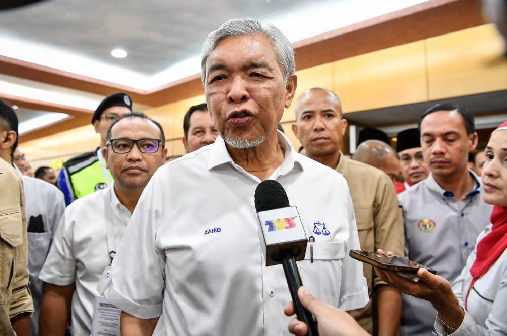 Ahmad Zahid speaking to reporters after a special meeting with Umno division chiefs, deputy chiefs and vice-chiefs at the World Trade Centre Kuala Lumpur (WTCKL) in Kuala Lumpur May 14, 2023. — Bernama pic