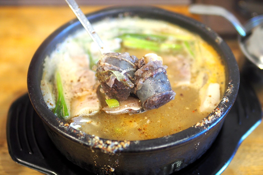 When it's raining, try their selection of soups with rice like the Sundae Gukbap filled with 'sundae', pork innards and entrails