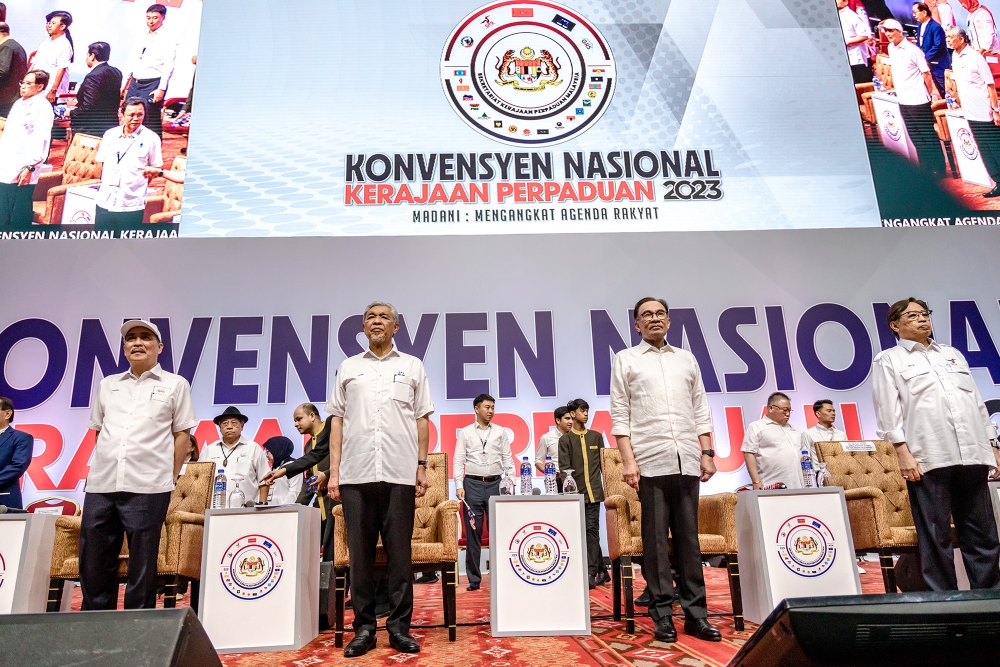 Prime Minister Datuk Seri Anwar Ibrahim is seen with other party leaders during the Unity Government National Convention at World Trade Centre Kuala Lumpur May 14, 2023. — Picture by Firdaus Latif