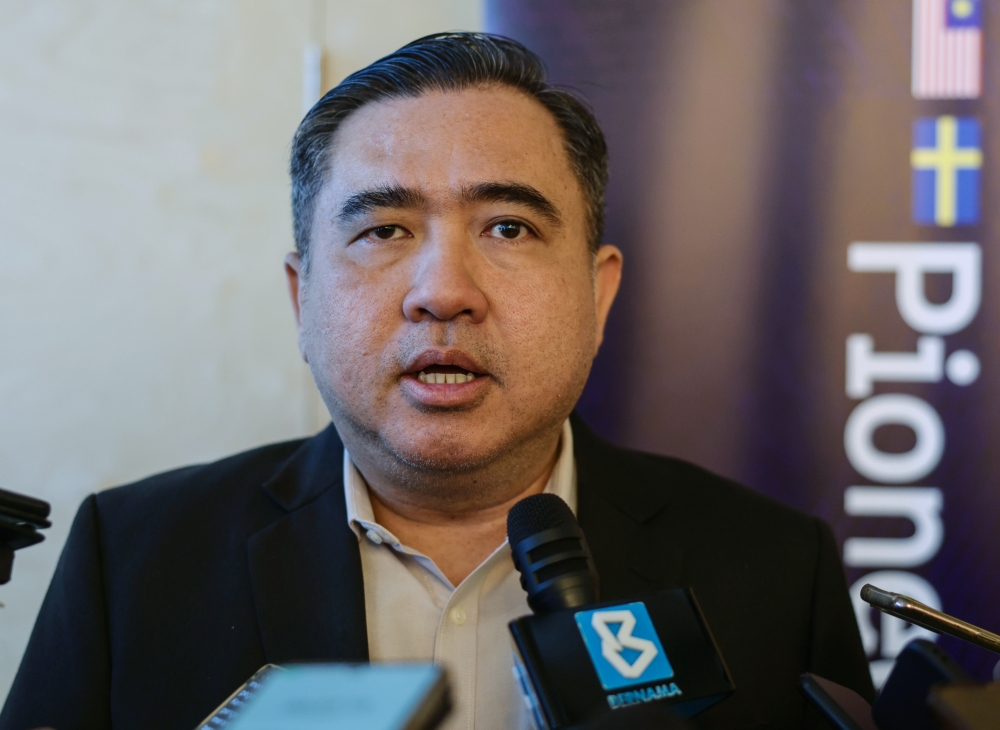 Transport Minister Anthony Loke speaking at a press conference after attending the Green Mobility and Transport Forum in Kuala Lumpur May 16, 2023. — Bernama pic