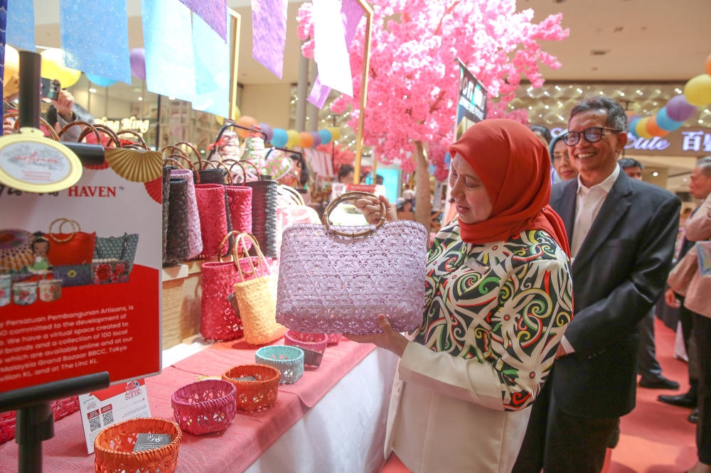 Datuk Seri Nancy Shukri visiting a booth during The Artisans Haven Awards Ceremony at Pavilion Shopping Mall in Kuala Lumpur May 16, 2023. — Picture by Yusof Mat Isa