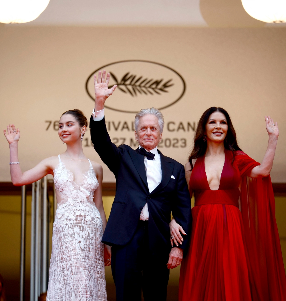 Michael Douglas was accompanied by his wife, Catherine Zeta-Jones, and their daughter, where the 78-year-old actor was given an honorary Palme d’Or. — Reuters pic