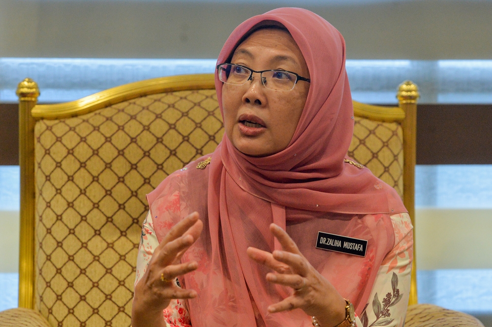 Minister of Health Dr Zaliha Mustafa speaks during Ministry of Health Raya open house at MAEPS, Serdang May 17, 2023. — Picture by Miera Zulyana