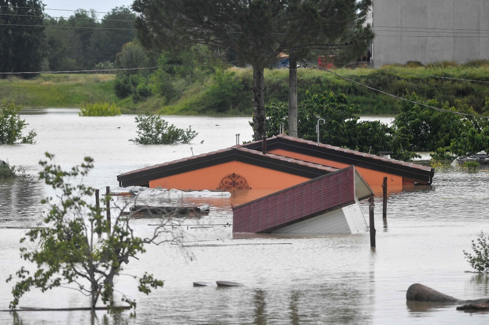 Downpours that pounded the region’s flatlands over two days caused nearly two dozen rivers to burst their banks, putting vast stretches of territory under water and causing thousands of residents to be evacuated. — AFP pic