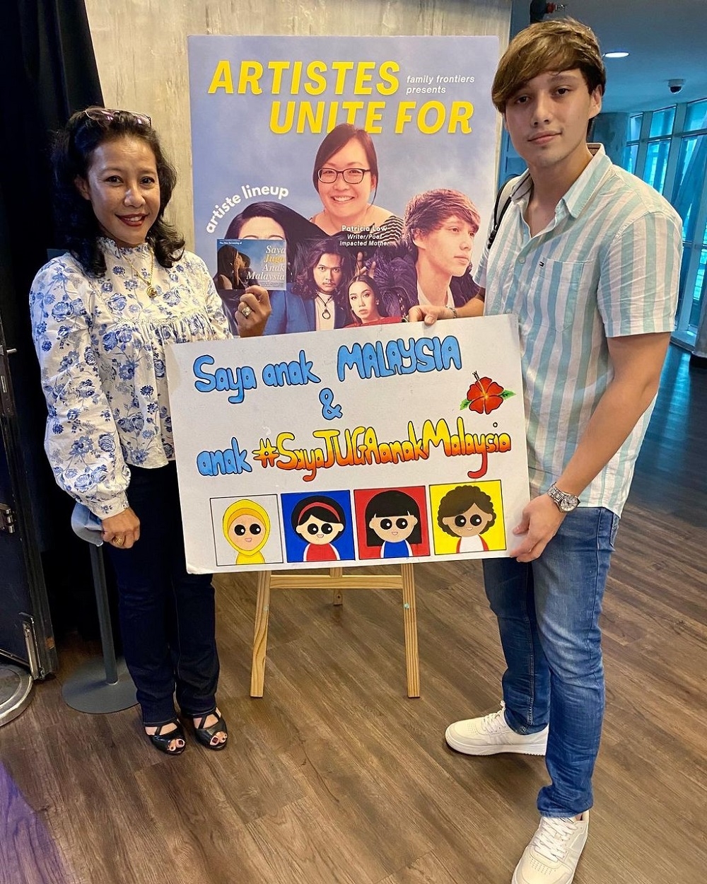 Danial with the placard showing the slogan #SayaJugaAnakMalaysia, which is part of Family Frontiers' campaign for Malaysian mothers' overseas-born children to also be recognised as Malaysians. ― Picture courtesy of Afique Danial Izzad Bogers