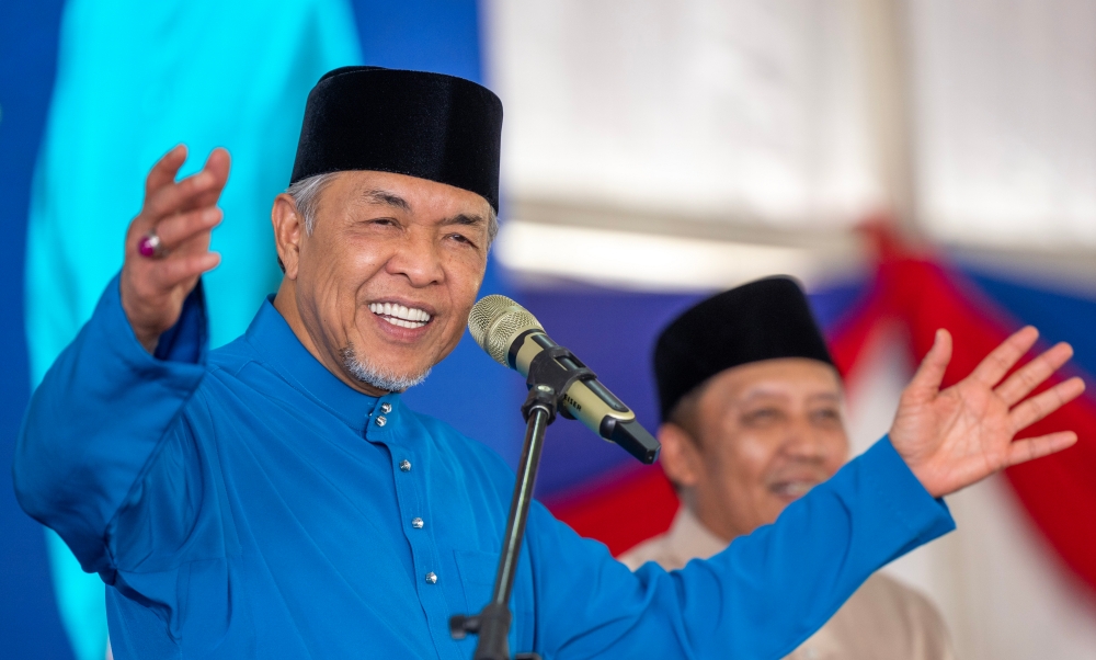 Deputy Prime Minister Datuk Seri Ahmad Zahid Hamidi delivers a speech during Felcra Berhad’s Raya celebration at Bukit Tiu in Machang May 20, 2023. — Bernama pic