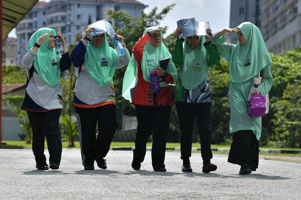 Education Minister Fadhlina Sidek said the special permission for students and teachers to wear appropriate sports attire during the current hot spell depends on weather conditions and is issued to avoid any health complications. — Bernama pic