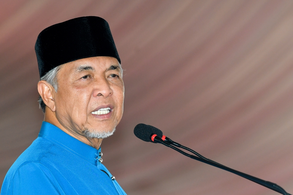 Deputy Prime Minister Datuk Seri Ahmad Zahid Hamidi delivers a speech during the Aidilfitri open house of the Negeri Sembilan Umno Liaison Committee in Tampin May 20, 2023. — Bernama pic