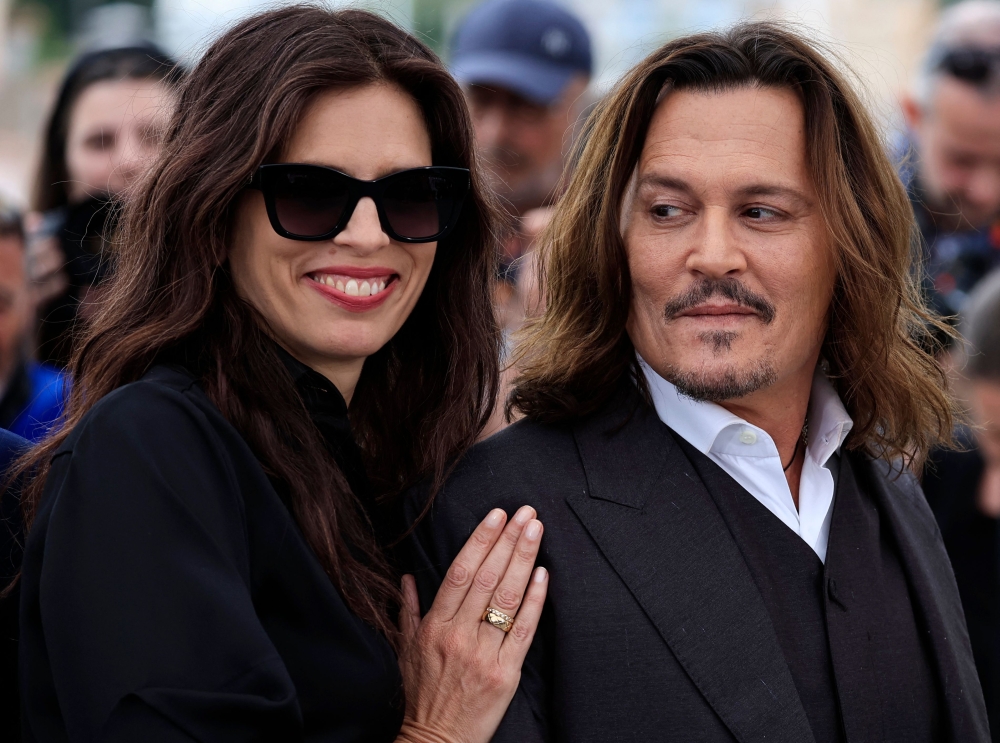 French actress and director Maiwenn (left) poses with US actor Johnny Depp during a photocall for the film ‘Jeanne Du Barry’ during the 76th edition of the Cannes Film Festival in Cannes, southern France, on May 17, 2023. ― AFP pic
