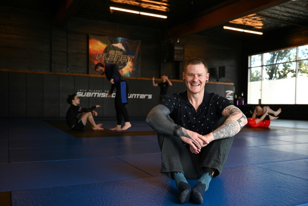 Jiujitsu instructor Tobias Shea, a US military veteran, poses for a photo at his studio in Portland, Oregon, on May 10, 2023. — AFP pic