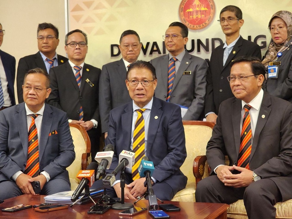 Sarawak Utility and Telecommunication Minister Datuk Julaihi Narawi (seated centre) is flanked by Datuk Liwan Lagang (left) and Datuk Abdul Rahman Junaidi at the press conference in Kuching May 22, 2023. — Galileo Petingi/Borneo Post pic 