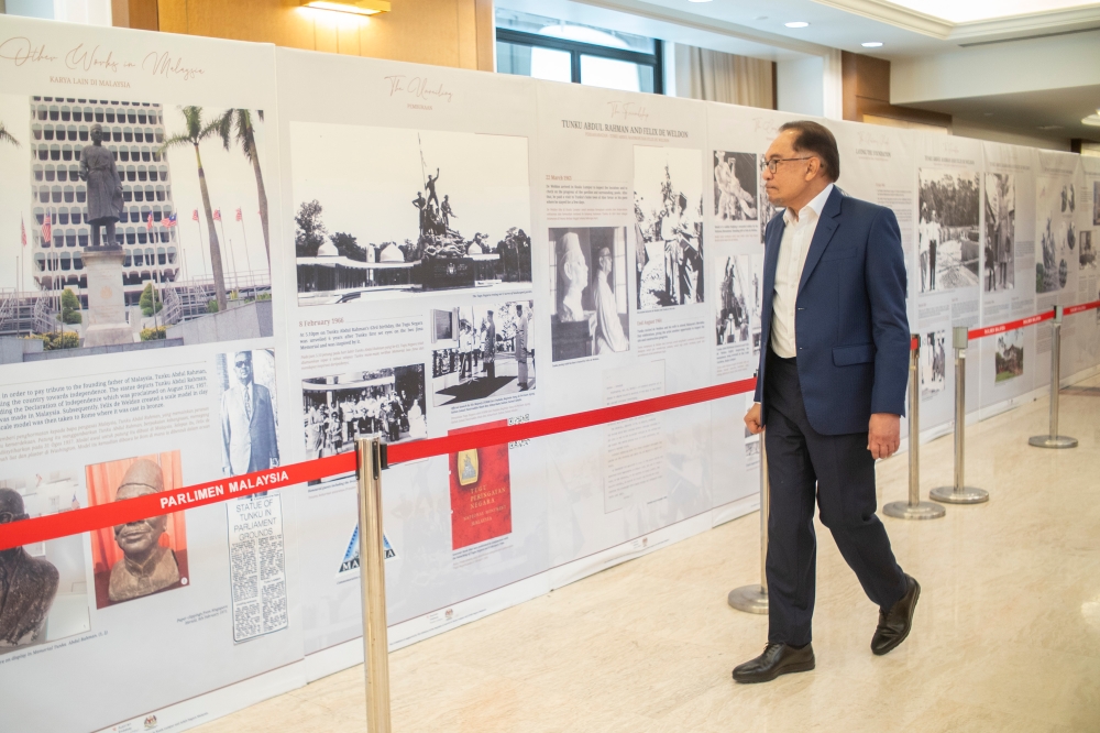 Prime minister Datuk Seri Anwar Ibrahim visits an exhibition at Parliament in Kuala Lumpur May 22, 2023. — Picture by Shafwan Zaidon