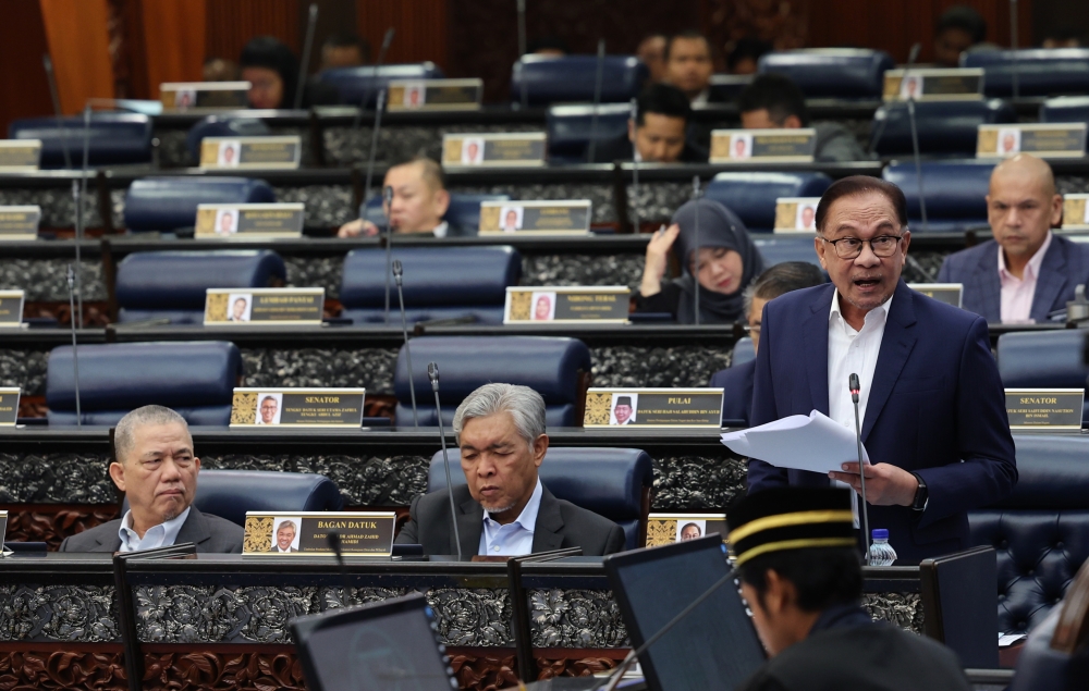 Prime Minster Datuk Seri Anwar Ibrahim speaks at the Parliament in Kuala Lumpur May 22, 2023. — Bernama pic