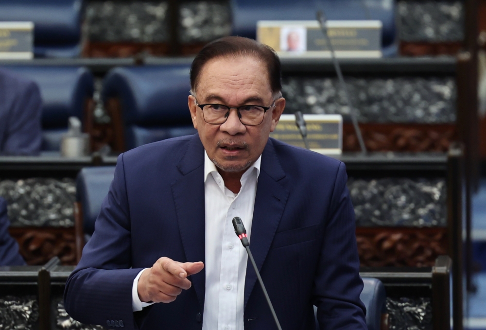During Prime Minister's Question Time (PMQ), Prime Minister Anwar Ibrahim says that the word ‘Allah’ can only be used by Muslims in Peninsular Malaysia, and with restrictions for non-Muslims in Sabah and Sarawak. — Bernama pic