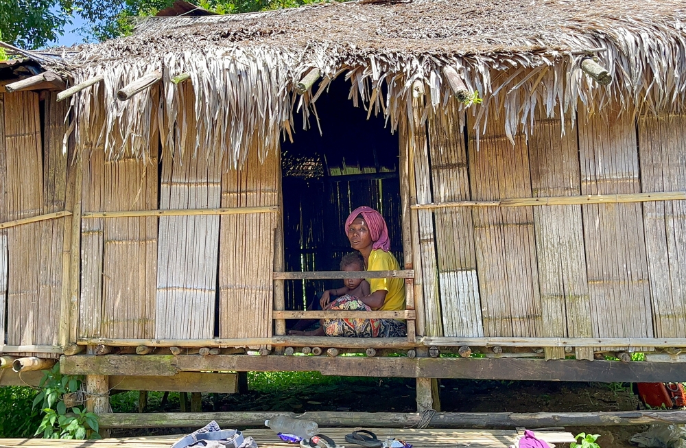 Orang Asli Rohani Asin, 40, rests in her bamboo house during the day before returning to her public housing residence at night. — Bernama pic