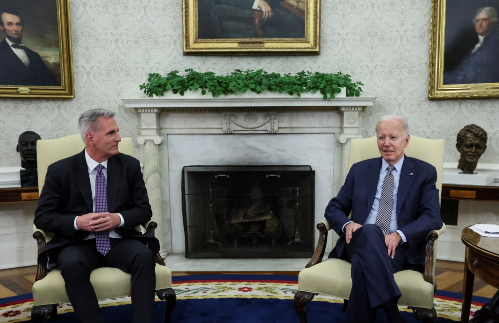 WASHINGTON, May 26 — US President Joe Biden and top congressional Republican Kevin McCarthy are closing in on a deal that would raise the government’s US$31.4 trillion debt ceiling for two years while capping spending on most items. — Reuters pic