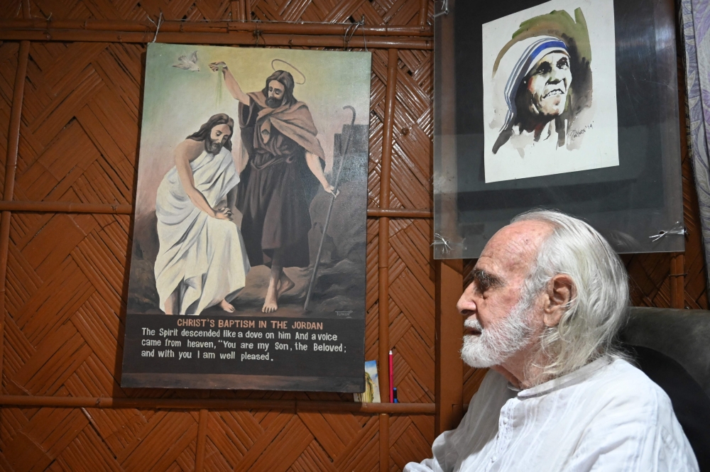 This picture taken on March 19, 2023, shows Brother Gaston Dayanand praying at the Inter-Religious Center of Development (ICOD) in Gohalapota village, Howrah district, southwest of Kolkata. — AFP pic