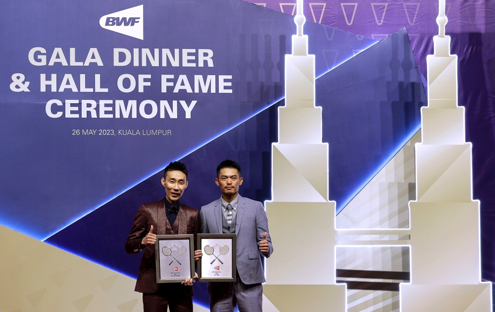 (From left) Malaysia's Datuk Lee Chong Wei and Lin Dan of China pose for a picture during the Badminton World Federation’s Badminton Hall of Fame Induction ceremony at Kuala Lumpur Convention Centre May 26, 2023. — Bernama pic